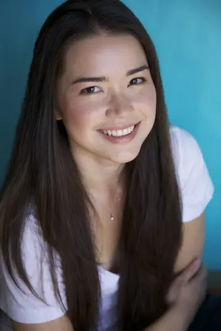 Achara Kirk photo 13 — Brown, Mixed-race (primarily Asian)