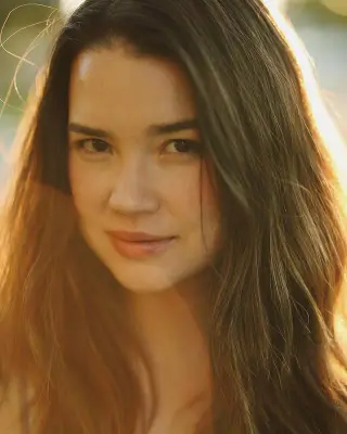 Achara Kirk photo 8 — Brown, Mixed-race (primarily Asian)