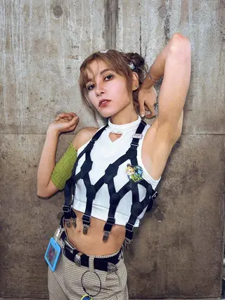 Fairouz Ai photo 6 — Athletic, Mixed-race (primarily Asian)