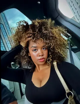 H.E.R. photo 10 — Brown, Mixed-race (primarily Black)