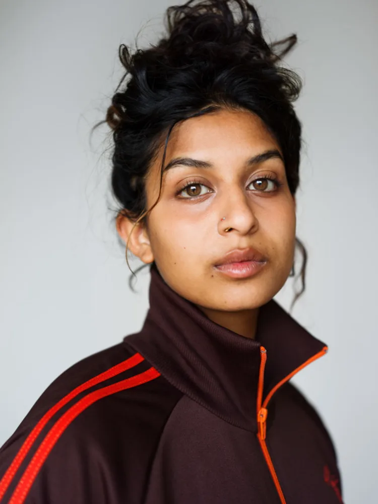 Kavitha Anandasivam photo 2 — Black, Brown