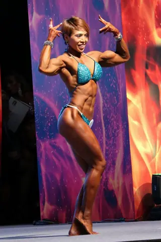 Kolly Li photo 2 — Black, Muscular