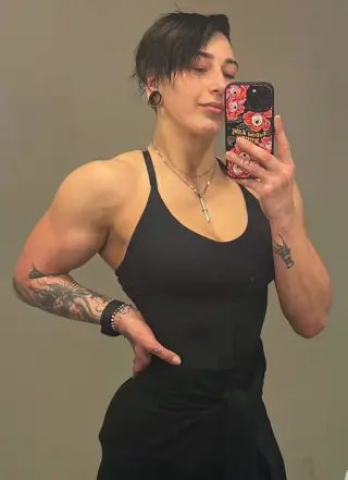 Rhea Ripley photo 9 — Muscular, Blue