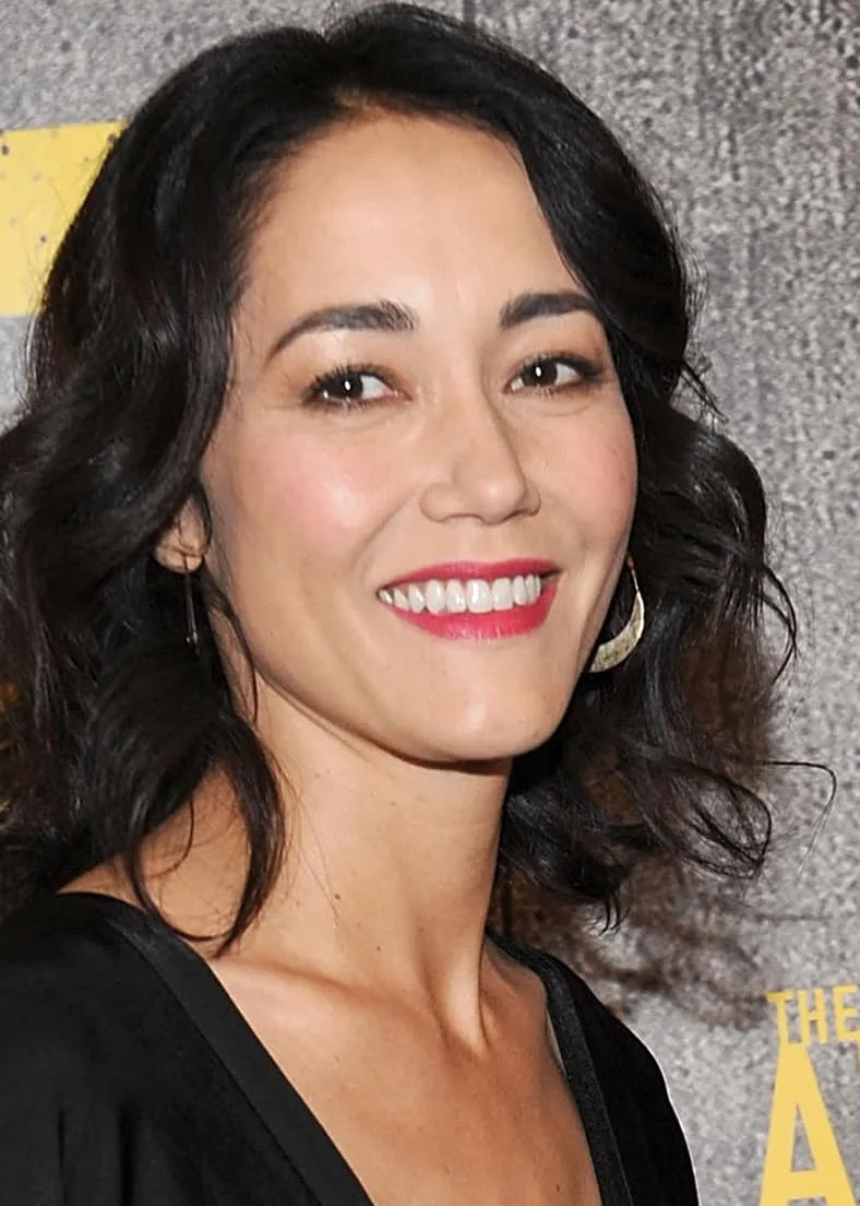 Sandrine Holt photo 4 — Brown, Mixed-race (primarily Asian)